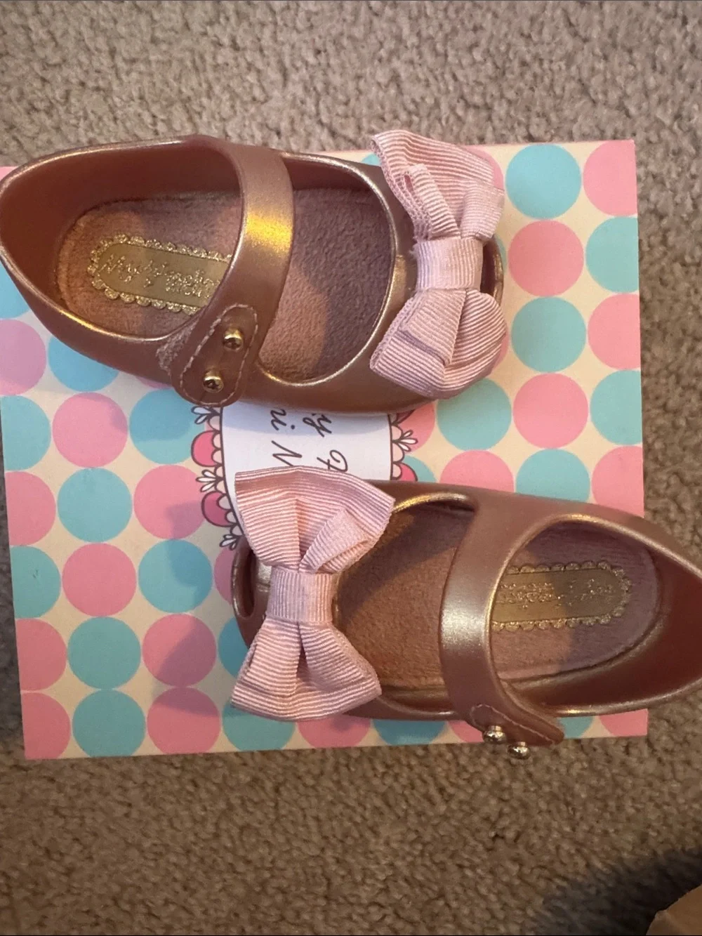 Mini Melissa Metallic Rose Gold Mary Janes with Pink Fabric Bows. Used w/box